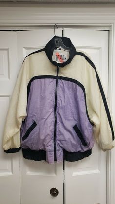 1980s Vintage Gitano Outerwear Windbreaker Nylon Large Jacket. Jacket is in very good condition. Please enlarge pictures to see condition. All clothing we sell is washed or dry cleaned. No returns. 90s Style Nylon Track Jacket For Fall, 90s Style Nylon Outerwear With Long Sleeves, Retro Spring Track Jacket For Outdoor, 90s Nylon Track Jacket For Fall, Retro Nylon Outerwear For Streetwear, Retro Oversized Windbreaker For Fall, Vintage Nylon Outerwear For Fall, 90s Style Nylon Spring Outerwear, Retro Nylon Windbreaker For Fall