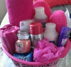 a pink basket filled with personal care items