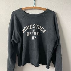 "Free People graphic crewneck sweatshirt 100% cotton. navy 90s type crewneck sweatshirt with white \"Woodstock\" across the front. Raw hem, great condition. measurements: 22\" pit to pit 22\" shoulder to hem Free shipping! We are a sustainable, curated and custom shop called AKIND - bringing new trends to one of a kind thrifted and vintage! We treat each order with care and are appreciative for each one. Please don't hesitate to contact us with questions about sizing or other; we respond quickly! We currently don't accept returns/exchanges due to the difficulty, delayed times, and expensiveness of shipping during a pandemic. Thank you for understanding!" 90s Black Tops With Letter Print, Black 90s Style Tank Top, 90s Black Tops With Text Print, 90s Cotton Crew Neck Tank Top, Cheap 90s Black T-shirt, Y2k Aesthetic, Graphic Crewneck Sweatshirt, New Trends, Free People