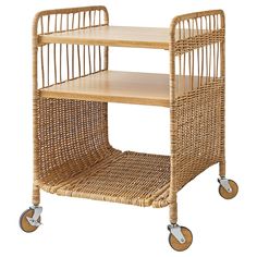 a wicker bar cart with two shelves on wheels