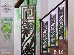 an iron stair railing with decorative designs on it