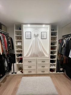 a closet with clothes and shoes in it