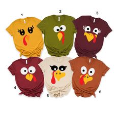 four different colored shirts with cartoon turkey faces on the front and one is red, white, green, yellow