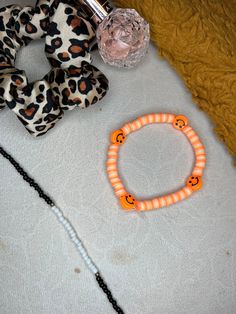 Creamsicle themed bracelet. clay beaded bracelet perfect for summer. these are bracelets that I make by hand. Cute Beaded Plastic Stretch Bracelet, Plastic Beaded Friendship Bracelets, Playful Orange Beaded Bracelets With Letter Beads, Cute Adjustable Polymer Clay Bracelets, Novelty Plastic Bracelets With Round Beads, Adjustable Cute Polymer Clay Bracelets, Adjustable Orange Bracelets With Heart Beads, Handmade Novelty Plastic Beaded Bracelets, Trendy Handmade Polymer Clay Bracelets