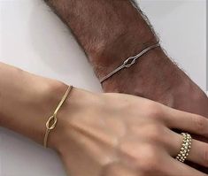 Description:   Love Knot Bracelet - Dainty Couple Bracelets -İnitial Bracelet - İnfinity Bracelet -  Sterling Silver Friendship  Jewelry - Best Friend Gift -  Gift for Couples - Love Knot Bracelet -   Personalized Bracelet   - Couples Jewelry   - Gift for mom - Love Knot Bracelet  -  Couple Bracelet -  Boyfriend Girlfriend Matching - Unisex Bracelet -  Love Knot Soulmate - Couples Bracelet - Birthday Gift - Bridesmaid Gift - Anniversary Gift - Valentines Gift -  --Our product is produced with care from 925 carat high quality silver. Snake chain is used in double bracelets. Our Bracelets:       Bracelet Length : 6.8 inch + 2 inch Extension ring (17 CM+5 CM)                       *Love Knot Necklace :16 İnch + 2 İnch Extension Ring     (40 CM+5 CM) -It is suitable for daily use. -All your or Him And Her Bracelets, Boyfriend And Girlfriend Jewelry, Promise Bracelet For Couples, Boyfriend Bracelet Couples, Engagement Bracelets, Matching Boyfriend, Boyfriend Jewelry, Matching Jewelry For Couples, Love Knot Bracelet