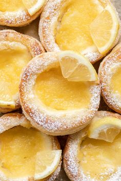 lemon filled pastries with powdered sugar on top