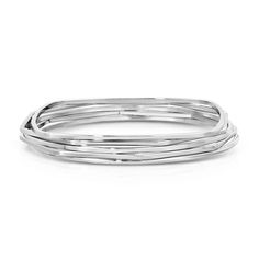 Skinny bangle set contains different shaped skinny bangles. Bangles measure 1/16" thick each with a diameter of 2.625"Finishes Available:14K Yellow Gold Rhodium (Silver) Minimalist Stackable White Gold Bangle, Polished Metal Bangle, Modern Stackable Round Bangle, Modern Sterling Silver Stackable Bangle, Modern Stackable Sterling Silver Bangle Bracelet, Adjustable Stackable White Gold Bangle, Stackable Sterling Silver White Gold Bangle, Stackable Sterling Silver Bangle In White Gold, Stackable White Gold Sterling Silver Bangle