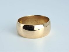 "Beautiful Victorian era 14K wide gold band by JR Wood, the Victorian-Art Deco era jeweler known for the best of fine jewelry. This band has a very high quality feel, with soft rounded edges and a beautiful vintage patina. Measures 7.2mm north to south and in excellent condition with all marks clearly legible. The in-out measurement is 1.2mm. Ring size 7 and easily sized up or down several sizes with all marks preserved.  Please allow two weeks for sizing. One month layaway payment plans on items $500 and over only.  Approximate Age - Victorian Gemstone(s) -  Metal - solid 14K yellow gold Weight - 5.78 grams Ring size - 7 Marks - 14K and JR Wood marks, Victorian era engraving Makers Mark - present Comments -  Service & Sizing Information: If you require ring sizing or service, kindly follo Wide Gold Band, Antique Collectors, Victorian Art, Art Deco Era, One Month, Wide Bands, Solid Metal, Gold Band, Ring Size 7