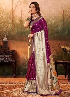 Wine Pure Silk Festival Wear Paithani Saree pavitrapaithanisilk 86005  Desc:  Description  Wine color Pure Paithani silk saree with zari weaving .The blouse comes as unstitched material.    Browse our stunning collection of festive wear and wedding silk sarees at KollybollyethnicS and enjoy complimentary worldwide shipping. Theres no need for a minimum order or coupon code. Elevate your festive spirit with our exquisite silk sarees this season. This Diwali weve introduced a wide array of budget- Paithani Saree Wedding, Wedding Sarees Online, Paithani Saree, Purple Saree, South Indian Sarees, Designer Silk Sarees, Weaving Designs, Indian Sarees Online, Wedding Saree Indian