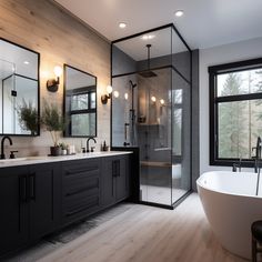 a bathroom with a large tub and two sinks