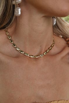 Gold choker. Adjustable clasp closure. All Lauren Nicole jewelry is nickel compliant. This item is Final Sale. Adjustable Chain Choker Necklace, Elegant Gold-tone Nickel-free Necklaces, Classic Jewelry With Adjustable Oval Link Chain, Classic Gold-tone Jewelry With Adjustable Chain, Vintage Adjustable Tarnish-resistant Jewelry, Elegant Metal Toggle Necklace With Rectangular Links, Minimalist Choker Chain Necklace With Lobster Clasp, Classic Gold Choker Jewelry, Classic Jewelry With Adjustable Chain For Jewelry Making