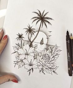 a woman is drawing flowers and palm trees on a piece of paper with colored pencils