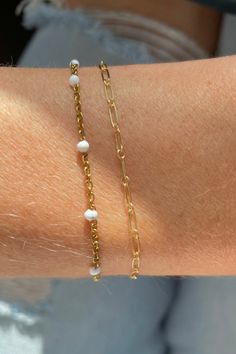 This playful yet dainty bracelet is our new obsession. It is stainless steel which makes it perfect for every day wear, plus you can keep it on when you workout and shower! 6.5 inches in length plus a 1 inch extender Casual Hypoallergenic Everyday Jewelry, Casual Everyday Hypoallergenic Jewelry, Hypoallergenic Stainless Steel Bracelets For Everyday, White Jewelry With Adjustable Chain For Everyday, White Tiny Beads Jewelry For Everyday, White Beaded Chain Bracelet, Trendy White Stainless Steel Jewelry, Modern White Everyday Jewelry, Trendy White Jewelry With Tiny Beads