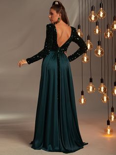 Product Code: FSWD0538 Embellishment: Sequin Fabric: 100% Polyester Back Style: Zipper Up Fully Lined: Yes Built-in Bra: No Available Color: Dark green Stretch: Moderate Fits true to size Imported Model Information: Height: 5' 2" Bust: 33.5'' Waist: 24“ Hips: 35.5” wearing US size Small Fitted Dark Green Evening Dress For Party, Dark Green Sequin Party Dress, Dark Green V-neck Party Dress, Fitted Dark Green Evening Dress For Banquet, Green Embellished Evening Dress For Party, Green Sequined Evening Dress For Banquet, Green Sequined Evening Dress For Banquets, Green Long Sleeve Holiday Evening Dress, Green V-neck Evening Dress With Sequins