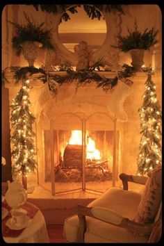 a living room with a fire place and christmas decorations