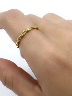 14K Solid Gold Twist Rope Ring, Twisted Rope Gold Wedding Band, Dainty Stacking Twist Ring, Real gold Delicate Twist Ring, Stackable Beaded 💎 PRODUCT DETAILS * Made to order * Gold: Solid 14K Gold * Choice of Gold: Gold ❗ CUSTOMIZATION Our ring comes in three different gold colours: Gold 📦 PACKAGING All items are nicely packaged ready to gift in elegant jewelry boxes. You can also leave a gift message for the recipient at checkout. 🚚 SHIPPING All items are handmade to order. Therefore , the w Gold Round Band Promise Ring, Elegant Gold Stackable Wedding Rings, Yellow Gold-plated Jewelry For Marriage, Yellow Gold Plated Jewelry For Marriage, Delicate Gold Jewelry For Marriage, Gold Stackable Rings For Marriage, Gold Fine Jewelry Promise Ring, Gold Stackable Round Band Rings For Marriage, Yellow Gold Plated Rings For Wedding