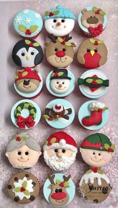 christmas themed cupcakes with frosting and decorations