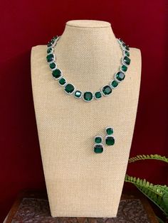 American diamond necklace . Premium crystal work . Comes with matching earring. Crystal Work, American Diamond Necklaces, Necklace Choker, American Diamond, Diamond Stone, Matching Earrings, Stone Necklace, Emerald Green, Penny