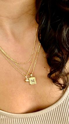 "14k Small Yellow Gold Framed Initial Necklace Charm, 14k Small Yellow Gold Framed Initial Pendant, Gold Initial Pendant, 14K Gold Pendant. Our Trendiest Pendant Great for Layers. . . . Lightweight Initial Pendant. All Letters Available in Both Sizes 20x12mm and 25x16mm. . . . * Chain: Sold Separately * Chain: Not Included * Stamp: Real 14k Gold * Never gold filled or plated * Packaged With Free Gift Box * A perfect gift for everyone. . . . Bail is included in the size of the pendant. . If you h Luxury Gold-plated Charm Necklace, Luxury Gold Pendant Charm Necklaces, Luxury Gold Pendant Charm Necklace, 14k Gold Filled Yellow Gold Charm Necklace For Anniversary, 14k Gold Tarnish-resistant Initial Necklace, Classic Gold Charm Necklace With Square Pendant, Elegant Gold Charm Necklaces With 17 Jewels, Gold-tone Initial Pendant Necklace, Gold-tone Tarnish Resistant Initial Pendant Necklace