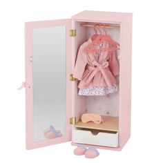 a pink doll's wardrobe with clothes and shoes