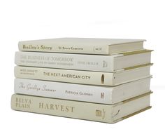 four books stacked on top of each other