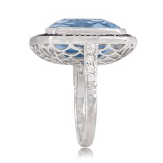 This impressive ring features a 16.35 carat emerald cut aquamarine surrounded by a halo of diamonds. Stunning openwork filigree adorns the under gallery, with accenting diamonds on either shoulder. ✦ DIAMOND SPECIFICATIONS: Diamond Cut: Emerald Cut Diamond Weight 16.35 Carats ✦ ENGAGEMENT RING SPECIFICATIONS: Ring Material: Platinum Stones: Aquamarine, Diamond, Sapphire ✦ WHAT COMES IN YOUR SHIPMENT: - Your Engagement Ring - Quality Ring Box - Jewelry Cleaner - UGL Certificate ✦ WHY SHOP WITH US Luxury Sapphire Baguette Cut Ring, Gia Certified Octagon Sapphire Luxury Ring, Gia Certified Octagon Sapphire Ring, Luxury Style, Luxury Gia Certified Baguette Cut Sapphire Ring, Luxury Gia Certified Octagon Sapphire Ring, Luxury Platinum Baguette Cut Sapphire Ring, Luxury Emerald Cut Sapphire Ring With Diamond Detail, Formal Asscher Cut Ring With Bezel Setting, Formal Emerald Ring With Center Stone Octagon Shape