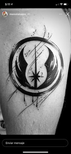 a star wars tattoo on the back of a man's leg, with black ink