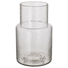 two clear glass vases stacked on top of each other