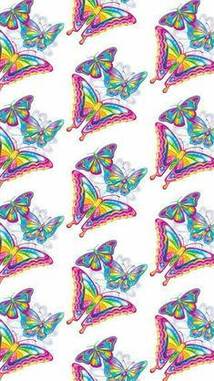 colorful butterflies on white background with lots of different shapes and sizes, all in rainbow colors