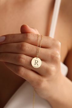 "Here is the super elegant initial necklace. You may design your necklace with any letter and dates as you want. This letter necklace is fully customizable and proper for any combine. This gold letter necklace is one of our favorite design and great gift idea for women. Gold Name Necklace is the most beautiful gift in the world. The easiest way to make a woman happy may be to order her a timeless letter necklace.  This personalized necklace would make a wonderful personalized Christmas gift, birthday gift, anniversary gift. The gold name necklace is a durable solid necklace. First quality materials are used while producing our letter necklaces.  Our chains are produced by hand with a special system. It has a solid form. All our jewelry is %100 custom made by hand with Love and Care in our Initial Pendant Necklace With Letter Print For Gift, Minimalist Initial Pendant Necklace As Anniversary Gift, Minimalist Initial Pendant Necklace For Anniversary Gift, Monogram Initial Necklace As Gift, Monogram Initial Necklace Gift, Minimalist Monogram Initial Necklace As Personalized Gift, Letter Print Initial Pendant Necklace As Gift, Gift Letter Print Initial Pendant Necklace, Initial Pendant Necklace With Name For Her