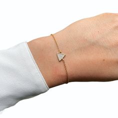 Metal: 925 Sterling silver, 18k yellow or rose gold vermeil. Dimensions of the Design: 10mm Length of the Bracelet: 14cm (5.5") + 3cm (1.2") extension A delicate and minimalist 18k gold vermeil bracelet. The bracelet is 925 Sterling Silver and all the sparkly stones on this gorgeous bracelet are cubic zirconia. This beautiful bracelet is available in three different colours and comes with a special jewellery box. It is perfect for every day wear and also it will make a perfect gift for your loved one. %100 HANDMADE & 925 SILVER STANDARD PACKAGING:  * High quality cardboard jewellery box * Polishing cotton * Care instruction * Special wish card in gold envelope ( You can also add gift wrapping for £5 ) SHIPPING TIMES: All orders are carefully packaged by ourselves in our little office in Lo Adjustable Gold Bracelet With Pave Setting, Dainty Rose Gold-plated Diamond Bracelet, Rose Gold Cubic Zirconia Gold Bracelet As Fine Jewelry, Rose Gold Plated Diamond Bracelet Gift, Rose Gold Cubic Zirconia Bracelet With Tarnish Resistance, Rose Gold-plated Diamond Bracelet For Gift, Rose Gold Bracelets With Pave Setting For Gift, Cubic Zirconia Diamond Bracelet In Rose Gold For Gift, Rose Gold Plated Round Diamond Bracelet