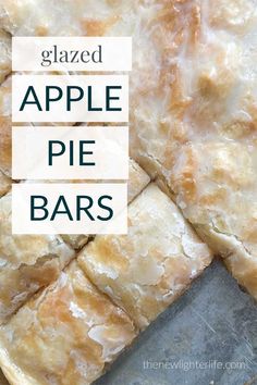 sliced apple pie bars sitting on top of a cutting board