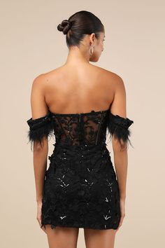 A night of magic starts with the Lulus Midnight Sparkle Black Embroidered Feather Bustier Mini Dress! Stunning embroidery, accented by sparkling black sequins, adorns a mesh overlay that shapes feather-trimmed, off-the-shoulder sleeves that frame the bustier-style bodice with padded cups and sheer mesh panels (with supportive boning). High, fitted waist sits atop a figure-flaunting bodycon skirt that ends at a sexy mini hem. Hidden no-slip strips at back of bodice and hidden zipper/clasp at back. Fit: This garment fits true to size. Length: Above mid-thigh. Bust: Great for any cup size. Waist: Fitted - very fitted at natural waist. Hip: Fitted - stretchy fabric allows room for hips. Undergarments: Padded cups - May be worn with petals, or no bra. Fabric: Fabric has some stretch. Cups and s 30th Birthday Dresses For Women, Winter Birthday Dress, Feather Skirt Outfit, Black Lace Dress Short, Short Sparkly Dresses, 30th Birthday Dresses, Sheer Bustier, Lace Dress Black Short, Midnight Sparkle