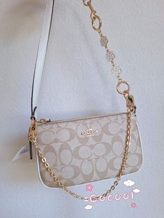 100% AUTHENTIC and BRAND NEW ! Condition is new with tags.  coach style # c3308 MSRP $188 +tax  coach care card inside  Plus a free gift: 2 extension chains One is camellia chain , other is gold chain  The camellia extension chain is perfect to become a shoulder bag or crossbody. ALL ITEMS ARE GUARANTEED 100% AUTHENTIC AND BRAND NEW!  Shipped with USPS priority /USPS Ground Advantage / UPS ground. Ship out in 2 business days or whenever possible same day! Please note that the color in pictures might differ slightly due to lighting, flash and screen resolution. In a smoke and pet free house! Please contact me if you have any questions. Thank you for supporting my small business!  Please view and check my other ebay store items! Product Details Signature coated canvas and smooth leather Colo Coach Nolita 19, Coach Nolita, Nolita 19, Swag Bags, Pretty Purses, My Style Bags, Gold Sand, Swag Bag, Girly Bags