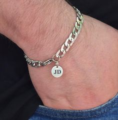 Personalized gifts such as a link chain bracelet are a thoughtful gift for him. Crafted from high-quality silver stainless steel, this chain bracelet features a sophisticated design that is both stylish and durable. Perfect for everyday wear or special occasions, this bracelet makes a great gift for yourself or a loved one. Add a touch streetwear style to your outfit with this sleek and modern accessory. 👉 Custom engraving on bracelets with a special message, whether it's initials, initials wit Gift Cuban Link Charm Bracelet With Curb Chain, Modern Silver Friendship Bracelets, Jubilee Bracelet In Stainless Steel For Friendship, Stainless Steel Cuban Link Jewelry As Gift, Engraved Cuban Link Bracelets As Gift, Cuban Link Chain Bracelet Engraved Gift, Personalized Metal Chain Bracelet, Stainless Steel Chain Link Jewelry As Gift, Silver Stainless Steel Friendship Jewelry