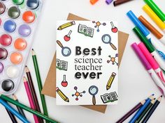 a card that says best science teacher ever surrounded by crayons and pencils