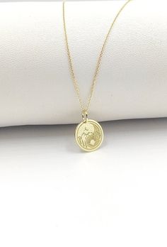 Welcome to ElegantGoldJewels,  Find all the information you need about your charm: Material of pendant: 14K Solid Gold Stamp: 585 (14K) Thickness: 0.5mm Jumpring Diameter: 4mm The pendant is available in 6 sizes: - 13mm / 0.52 inches - 15mm / 0.59 inches - 18mm / 0.70 inches - 20mm / 0.78 inches - 22mm / 0.86 inches - 24mm / 0.94 inches - 26mm / 1.02 inches - 28mm / 1.10 inches - 30mm / 1.18 inches Chains Information: Rolo Chain: -14K Real Gold - 0.70mm thick - Spring Ring Clasp - 16 inches / 40 Spiritual Coin Charm Jewelry, Spiritual Coin-shaped Charms Jewelry, Spiritual Coin Charms Jewelry, Spiritual Charms Necklaces For Commemoration, Spiritual Memorial Coin Pendant Jewelry, Memorial Spiritual Coin Pendant Jewelry, Symbolic Charms Necklaces For Commemoration, Symbolic Charms Necklace For Commemoration, 14k Gold Spiritual Coin Necklace With Round Pendant