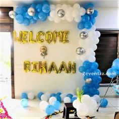 balloons and streamers decorate the entrance to a party