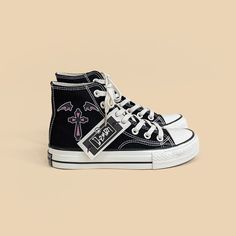 Fly with Style and Spookiness in our Bat Wings High Top Shoes! 🦇👟 🌟 Unique and Edgy: These high top shoes are perfect for adding a touch of individuality and gothic style to your look. Ideal for those who appreciate a blend of uniqueness and comfort. ✨ Superior Quality: Crafted with precision to ensure top-notch quality. Designed for a comfortable fit and featuring distinctive bat wing details. 💫 Versatile and Stylish: These shoes make a statement, making them suitable for various occasions. Trendy Black Canvas Shoes For Streetwear, Edgy High-top Sneakers For Streetwear With Rubber Sole, Edgy High-top Sneakers With Rubber Sole For Streetwear, Trendy Black High-top Canvas Shoes, Black Punk Sneakers For Streetwear, Trendy Black High-top Sneakers With Flat Heel, Streetwear High-top Platform Sneakers, Platform High-top Sneakers For Streetwear, Flat Heel Platform High-top Sneakers For Streetwear