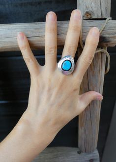 This vintage Navajo ring is handcrafted with Sterling Silver and Turquoise by Ted Goodluck, now deceased. He worked with his daughter Valerie on many items such as this ring. Shadowbox is not common among Navajo silversmithing due to the difficulty in creating the dome surrounding the stone. This is one of my last rings by Teddy, as they are highly sought after collectors items. Vintage Native American Navajo Handcrafted, never worn. Size: 8.5 This ring can be sized up or down within two sizes for an additional fee. Please send an email before the time of purchase if needed. Measures: 1 1/8" x 3/4" 5 Grams Signed: TG (Ted Goodluck) with hallmark 4 leaf clover, V (Valerie Goodluck) Navajo Rings, Vintage Navajo, Good Luck, Clover Leaf, Shadow Box, Turquoise Ring, Ring Size, Turquoise, Sterling Silver