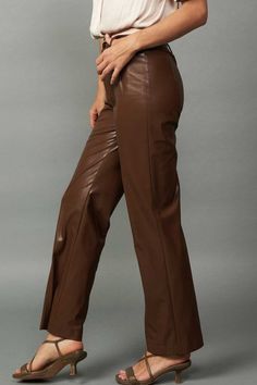 Faux leather straight leg pants. Available in chocolate brown. 55% Polyester, 45% Polyurethane Brown Full Length Faux Leather Pants, Brown Full-length Faux Leather Pants, Brown Faux Leather Full-length Pants, Trendy Brown Leather Pants For Fall, Brown Straight Pants For Workwear, Brown Fitted Straight Pants, Fitted Straight Brown Pants, Sleek Fitted Brown Leather Pants, Brown Wide Leg Leather Pants For Fall