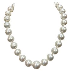 South Sea Pearl graduated diamond platinum necklace, circa 1990s. The South Sea Pearl Graduated Diamond Platinum Necklace is a luxurious and elegant piece of jewelry that exudes sophistication and class. Crafted with fine materials, this necklace showcases the beauty of South Sea pearls and diamonds set in platinum, creating a stunning combination that is sure to turn heads. South Sea pearls are known for their large size, smooth surface, and lustrous appearance, making them highly coveted in th Formal Single Strand Fine Jewelry Necklace, Fine Jewelry Single Strand Necklace For Formal Occasions, Single Strand Fine Jewelry Necklace For Formal Occasions, Elegant Formal Custom Silver Necklace, Classic Diamond White Necklace For Formal Occasions, Fine Jewelry Platinum Necklace In White, Fine Jewelry White Platinum Necklace, Classic Diamond White Necklaces For Formal Occasions, Classic Formal Diamond White Necklace