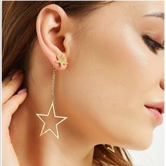 New Dangling Star 14k Gold Plated Earrings Elegant Metal Earrings With Star Charm, Elegant Star-shaped Pierced Jewelry, Elegant Star-shaped Gold Plated Earrings, Elegant Gold Plated Star Earrings, Elegant Gold-plated Star Earrings, Star-shaped Single Earring As Gift, Star Shaped Single Earring As Gift, Star Shaped Single Earring For Gift, Tarnish Resistant Star Earrings