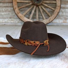 The Stellar (short) is a smaller version of our best selling hat band. Specially designed for small sized hats (6 7/8 and under) and kids hats.    100% Feather  Length: approx. 53cm (not including leather ties)  Width: 2cm  Crest dimensions: 4"w X 3"h Feather Hat Band, Western Men, Beaded Hat Bands, Kids Belt, Beaded Hat, Feather Hat, Outdoor Hats, Pets For Sale, Cowboy Boots Women