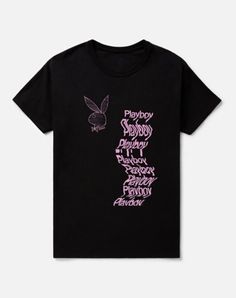 Put a trippy spin on your casual wear with this black Playboy Bunny wavy t shirt! With its pink writing in a variety of pink fonts and styles, this graphic tee is sure to make everyone look twice. Officially licensed Exclusively at Spencer's Crewneck Short sleeves Material: Cotton Care: Machine wash; tumble dry low Imported This shirt is Unisex Sizing only For a fitted look, order one size smaller than your normal size Playboy Bunny Shirt, Spring Y2k T-shirt With Graphic Design, Y2k Style Graphic T-shirt For Spring, Spring Y2k Graphic Design T-shirt, Spring Y2k Graphic T-shirt, Spring Y2k Style Graphic T-shirt, Pink Y2k T-shirt With Letter Print, Pink Grunge T-shirt With Screen Print, Trendy Pink T-shirt With Text Print