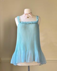 - Victoria's Secret 2006 babydoll sheer minty turquoise blue slip dress featuring crinkled fabric with ruffled sleeves Listed at $690, but I'm open to offers! Interested in bidding? Head over to my Instagram @dokidoki.vintage to join in! 🎬✨Feel free to message me with your best offer--let's make a deal! 💬 Ships quickly Trusted seller No returns or refunds - rosette adorned; scooped back; style worn by Sabrina Carpenter- size XS- lovely condition with no flaws 🤍 Size of mannequin: size 2 - 4 Grab it before it's gone! 💖 Babydoll Sleep Dress, Vintage Baby Doll Dress, Sabrina Carpenter Babydoll Dress, 60s Babydoll Dress, Blue Baby Doll Dress, Babydoll Dress Outfit, Vintage Babydoll Dress, Blue Babydoll Dress, Sabrina Carpenter Style