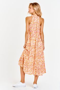 Multi-tiered skirt midi dress, v-neck finished sleeveless with neck ruffle & tassles in contemporary floral print. Blooming floral showcasing life's optimism, always rosy & just cheered! Multi print woven on relaxed fit.Body length from HPS: 46", Sleeve lenght: N/A, Bust: 42" (Size Small) 100% RAYON Machine wash cold, Line dry Imported Pink Tiered Maxi Dress For Summer, Pink Tiered Skirt Maxi Dress For Summer, Spring Halter Neck Midi Dress With Ruffles, Pink Tiered Skirt Midi Dress For Brunch, Summer Midi Dress With Ruffles And Halter Neck, Feminine Tiered Summer Midi Dress, Sleeveless Midi Dress With Ruffle Hem For Spring, Summer Pink Tiered Skirt Dress, Summer Tiered Skirt Dress In Pink