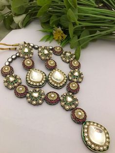 Most eligible gift for someone you love and someone very special for you. Long Kundan Polki Necklace with matching Earrings Suitable for all kind of outfits like Kurtis, lehanga and Sarees  Best gift for your loved ones. Best gift for her Birthday. Necklace : 1 Earrings : 1 Pair Kundan Multi-stone Necklace As Gift, White Kundan Jewelry Sets As Gift, Fusion Multi-stone Kundan Necklace As A Gift, Fusion Style Multi-stone Kundan Necklace Gift, Luxury White Kundan Necklace For Festive Occasions, White Kundan Fusion Necklace, Multicolor Gemstone Jewelry Sets For Weddings, White Fusion Style Kundan Necklace, Elegant Multicolor Hand Set Bridal Sets