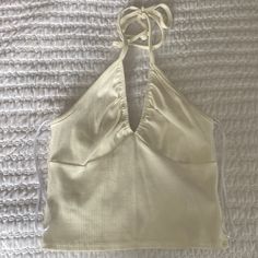 New With Tags. Urban Outfitters Ivory Halter Top. Size Xs Chic White V-neck Halter Top, Chic White Fitted Halter Top, White Cotton Halter Neck Tank Top, Trendy Fitted White Halter Top, Fitted Cream Halter Neck Top, White Fitted Halter Neck Top, White Summer Halter Neck Tank Top, White V-neck Crop Top For Spring, White Casual Halter Neck Tank Top