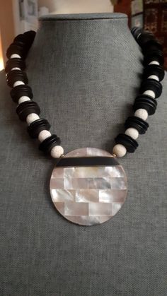 Mosaic mother of Pearl pendant on brass base, black and white bead necklace. 18". Barrel clasp White Bead Necklace, Mother Of Pearl Mosaic, White Beaded Necklaces, Mother Of Pearl Pendant, Beaded Statement Necklace, White Beads, Round Pendant, Pearl Pendant, Black Beads